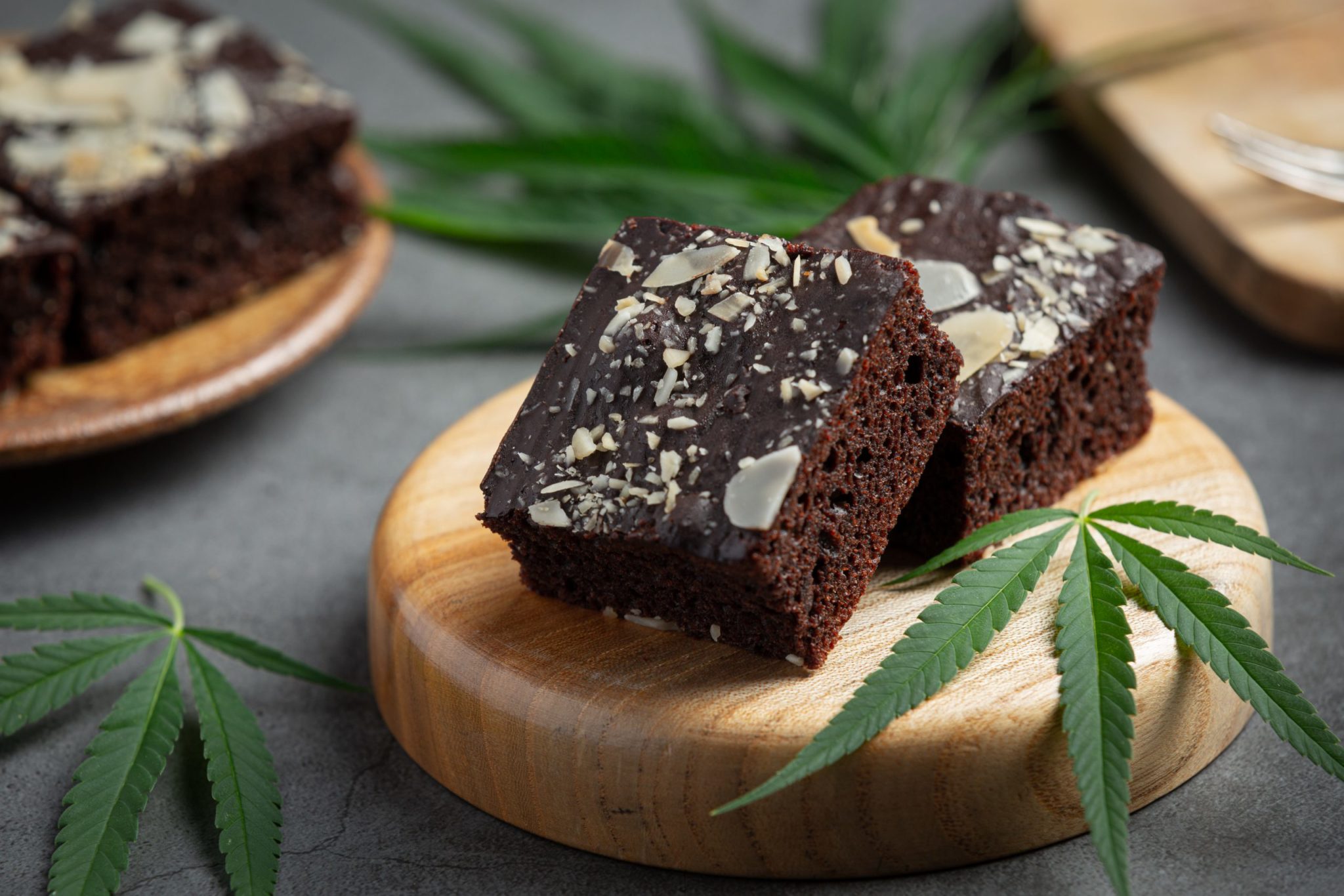 cannabis brownies cannabis leaves put wooden cutting board scaled