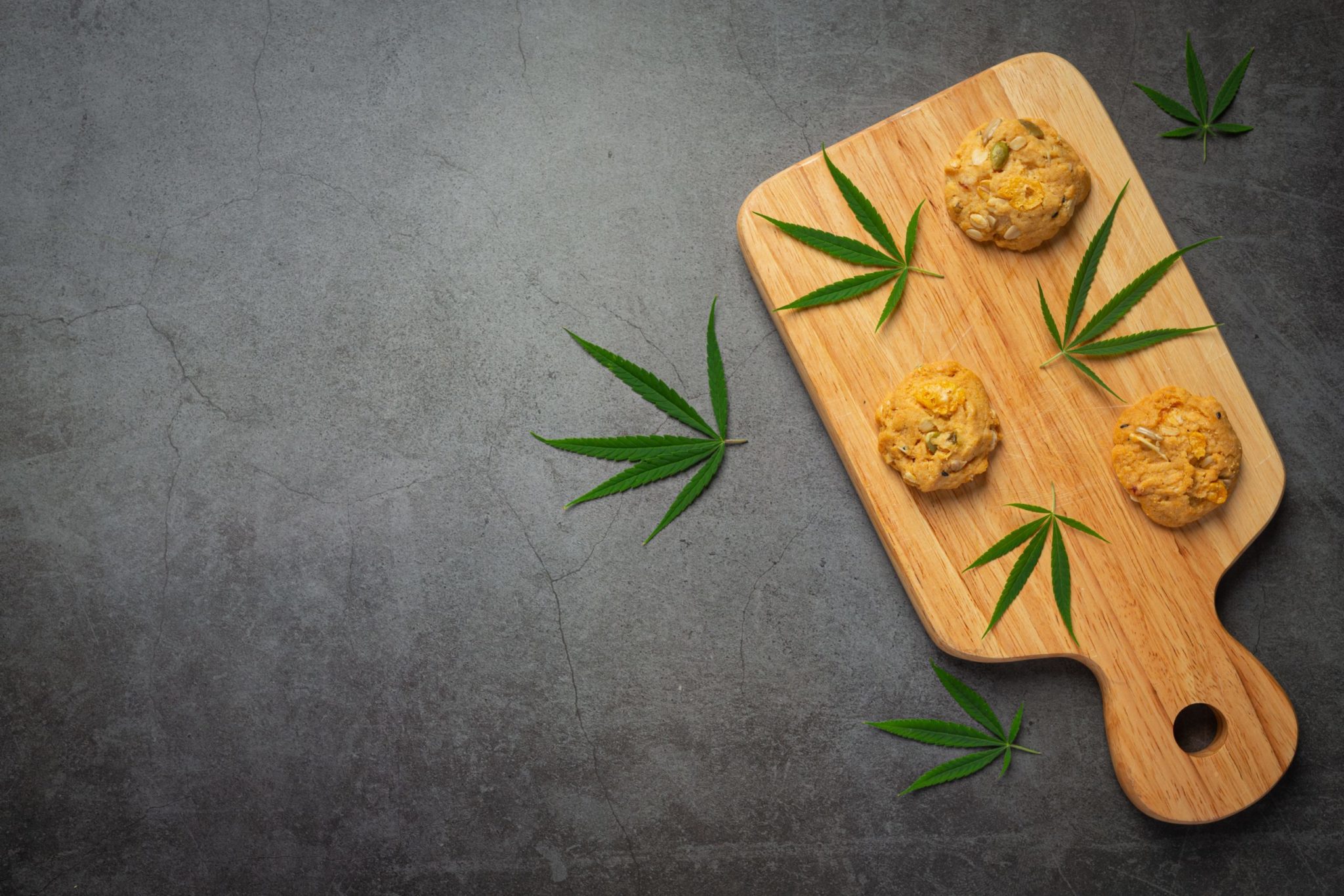 cannabis cookies cannabis leaves put wooden cutting board scaled